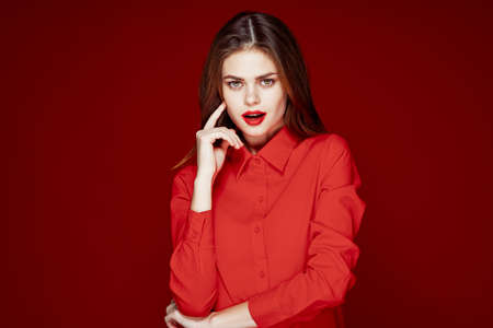 beautiful woman hairstyle makeup red shirt modelの写真素材