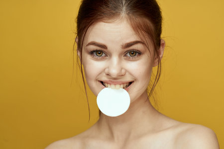 emotional women bare shoulders cotton pads and clear skin attractive look