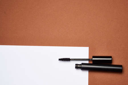 makeup brushes mascara accessories glamor brown backgroundの写真素材