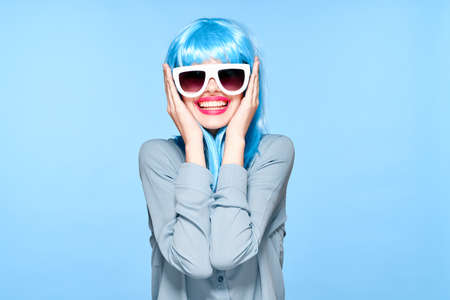 fashionable woman cultural wig sunglasses posing modelの写真素材