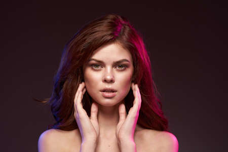 pretty woman makeup posing naked shoulders hairstyle cropped viewの写真素材