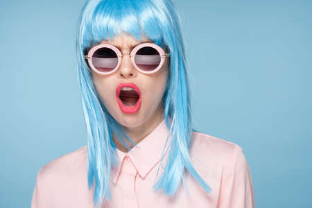 beautiful woman in blue wig sunglasses Glamor fashionの写真素材