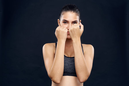 woman athlete fitness workout exercise close-up black background