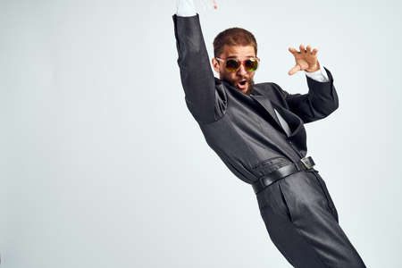 business man pink balloons office party light backgroundの写真素材