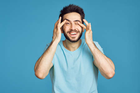 bearded man with headache migraine health problemの写真素材