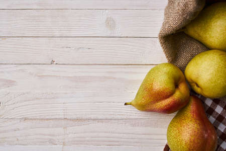 pears on wooden table agriculture vitamins close-upの写真素材