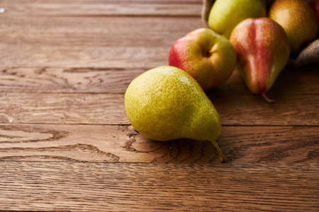 pears on wooden table agriculture vitamins close-upの写真素材
