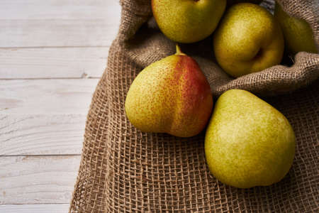 pears on wooden table agriculture vitamins close-upの写真素材