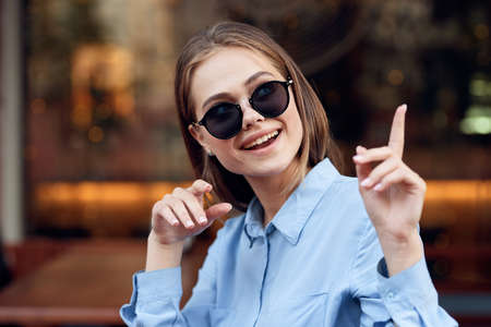 Business woman in a cafe outdoors fresh air summerの写真素材