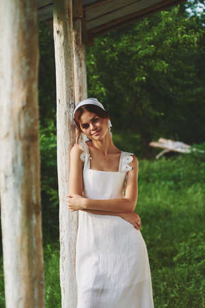 cheerful woman outdoors in the garden countryside ecology natureの写真素材