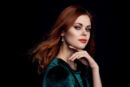 pretty woman green dress red lips charm Black backgroundの写真素材