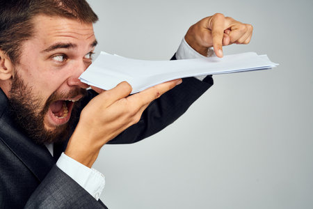 business man in suit documents here is the officeの写真素材