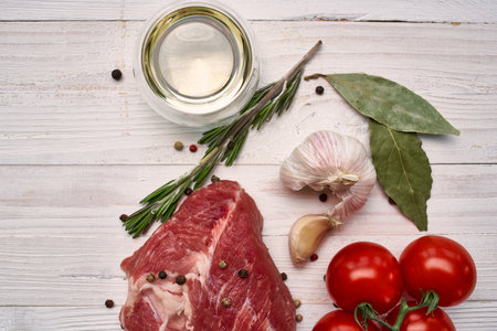 meat steak food cherry tomatoes ingredients rosemary kitchen cookingの写真素材