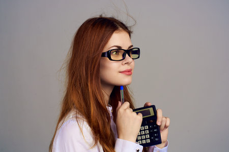 Business woman secretary working calculator office professional