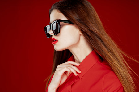 glamorous woman wearing sunglasses red shirt hairstyle model