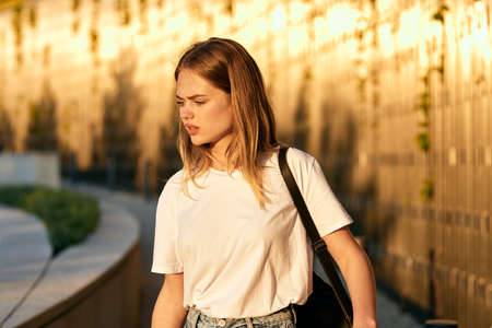 Business woman in a cafe in the summer outdoors on vacationの写真素材