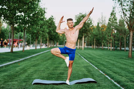 man doing sports in the park outdoors cardio CrossFitの写真素材