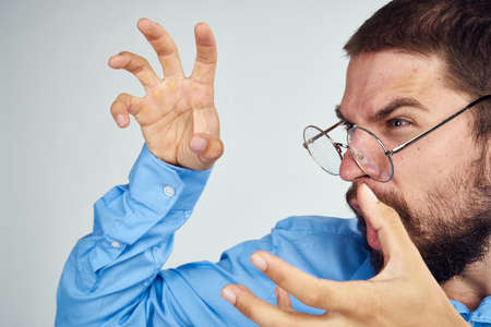 emotional male manager and no shirt hands professional lifestyleの写真素材