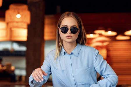Business woman in a summer cafe outdoors lifestyleの写真素材