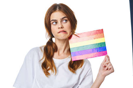 woman wearing white t-shirt lgbt flag inventor communityの写真素材