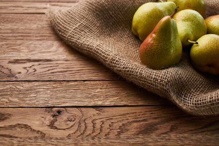 pears on wooden table agriculture vitamins close-upの写真素材