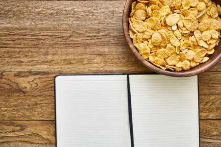 dry breakfast cereals notepad diet wooden backgroundの写真素材