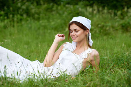 cheerful woman outdoors in the garden countryside ecology natureの写真素材