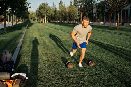 sporty man workout in the park exercise lifestyleの写真素材