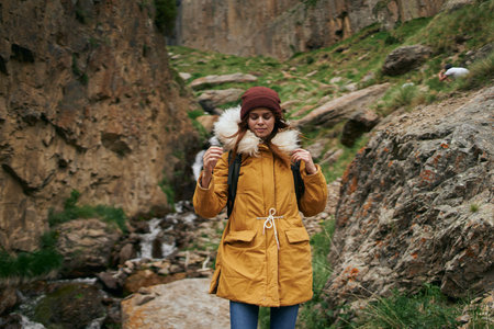 woman hiker with backpack mountains travel adventure freedomの写真素材