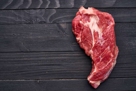 meat beef rosemary steak ingredients wooden tableの写真素材