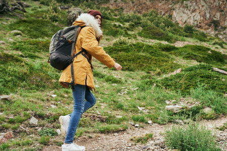 woman hiker with backpack mountains travel adventure freedom
