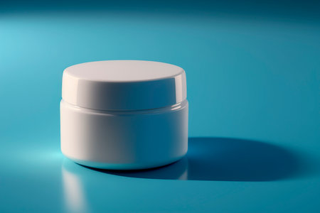 Modern beauty product beauty cream for skin care and moisturizing anti-aging cream jar top close up view on blue background, health and beauty concept. Copy space, template. Generative AI.の素材