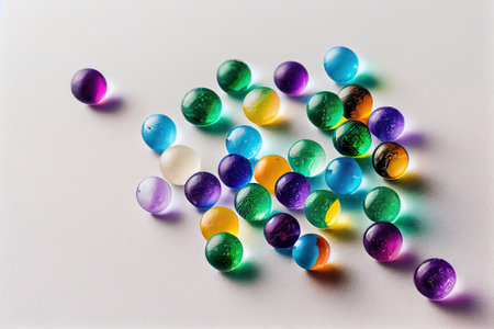 transparent glass balls for aquarium, toy on white insulated background, multicolor, colored Generative AIの素材