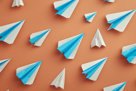 Group of paper airplanes soaring through the air in a vibrant orange sky, 3d rendering conceptの素材