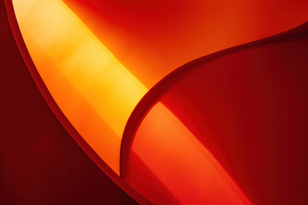 Abstract reflections of light on red and orange artwork, creating a stunning visual experienceの素材