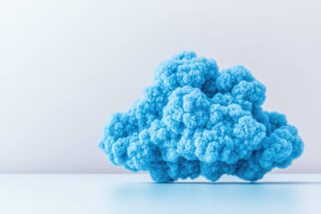 A vibrant blue cloud shaped sculpture on a minimalistic white background, symbolizing creativity and imagination in modern designの素材