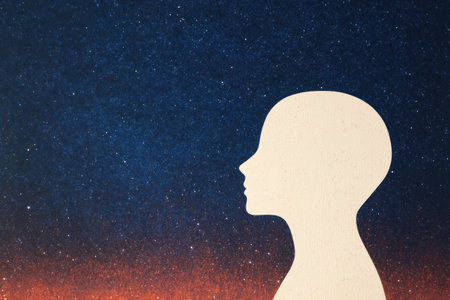 Silhouette of a serene profile against a starry night sky, symbolizing introspection and dreams, ideal for calm and reflective themesの素材