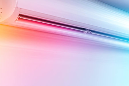 Modern air conditioning unit with sleek design and cool color tones, symbolizing comfort and efficiency in any seasonal environmentの素材