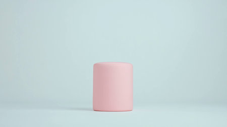 Minimalist pink cylindrical object on a soft blue background, emphasizing pastel colors and modern design, perfect for contemporary decor or product photographyの素材