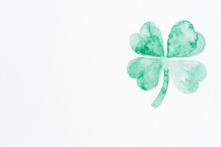 Green watercolor illustration of a four leaf clover symbolizing luck and prosperity, ideal for St Patrick s Day or eco friendly themesの素材
