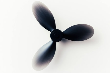 Black propeller spinning, showcasing a dynamic motion with a sleek design against a light backdrop, perfect for concepts of technology and aviationの素材