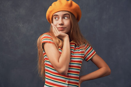 Teenage girl blonde isolated texture wall Studio
