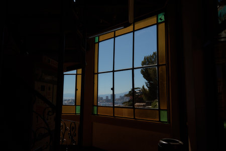 the view of Genoa through the stained glass window of the funicularの写真素材