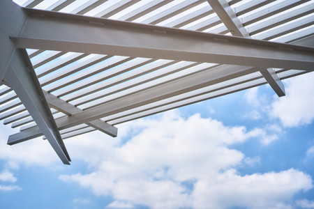 a metal canopy on the beachの写真素材