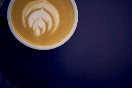 cups of coffee, latte and cappuccino on a table in a cafe
