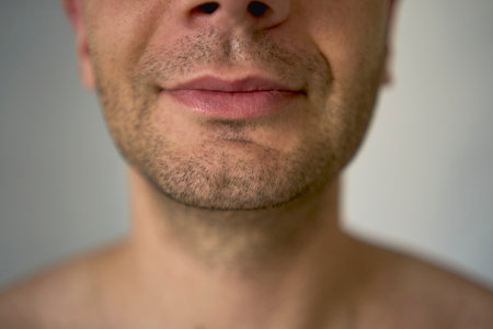 chin with bristles  of a thirty-year-old man of medium buildの写真素材