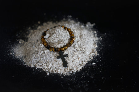 spiritual bracelet with a cross in ashes, funeralの写真素材