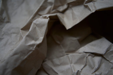 crumpled brown wrapping paper, texture, backgroundの写真素材