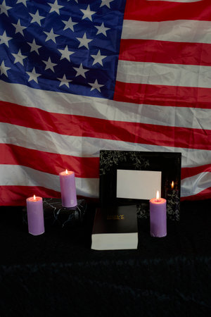 photo frame, candles, marble urn for ashes, holy bible and spiritual bracelet with black crossの写真素材