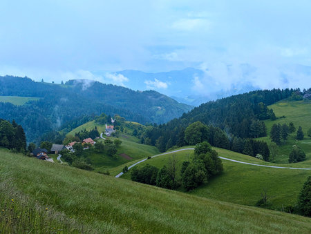 Breathtaking panoramic landscape of green slovenian mountain valleys